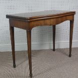 A Victorian mahogany serpentine fold over Card Table, on square tapering legs, signs of woodworm