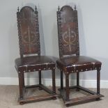 A pair of late 19th/early 20thC Gothic style Hall Chairs, upholstered in leather printed in