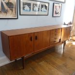 A 1960s retro G-Plan Teak              'Brasilia' Sideboard, in the Danish style, with four