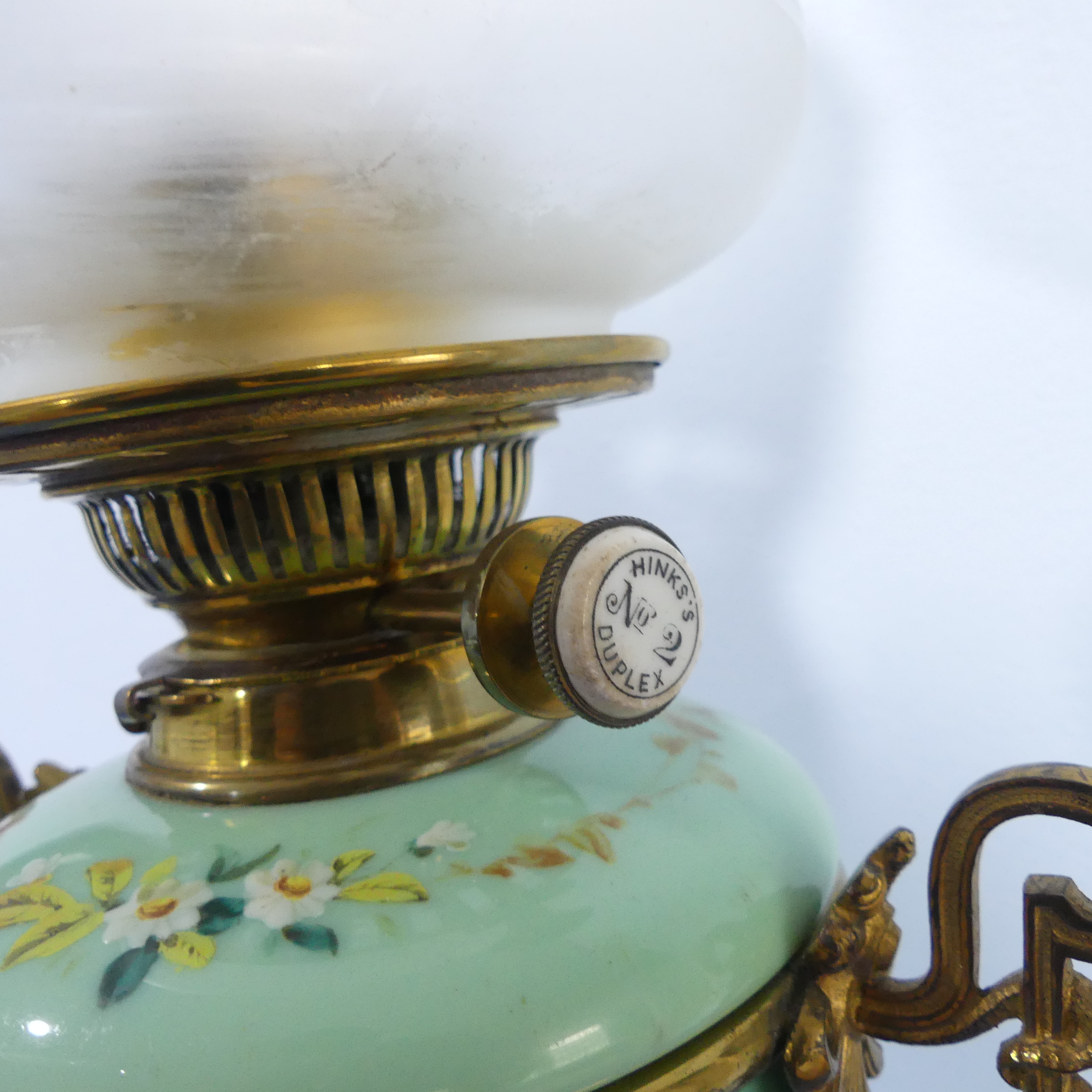 An Edwardian glass and gilt-metal oil lamp, with  moulded shade above a green opaque oviform lamp - Image 7 of 9