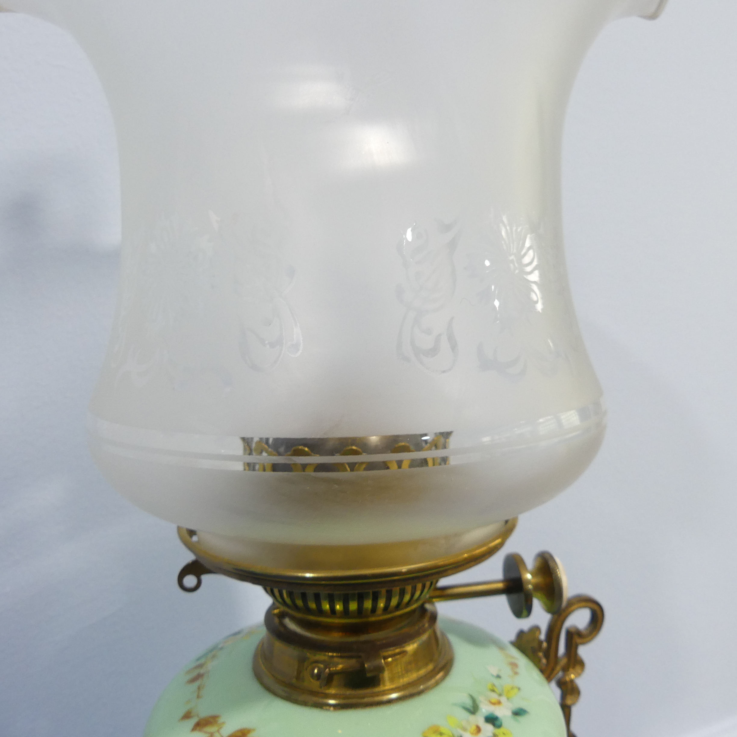 An Edwardian glass and gilt-metal oil lamp, with  moulded shade above a green opaque oviform lamp - Image 6 of 9