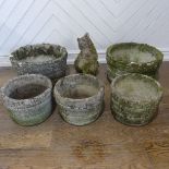 A lot of five weathered reconstituted stone planters, shaped and carved to look like wooden barrels,