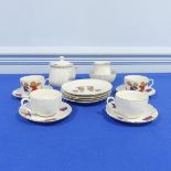A Bavarian porcelain child's Tea Set, to comprise four Tea Cups and Saucers, Teapot, etc. 15