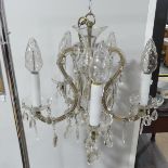 A five branch glass and brass Chandelier, with glass droppers and glass candle effect cylinders, W