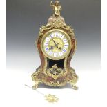 A late 19th century French Boulle work Mantel Clock, the elaborate case with tortoiseshell veneer,