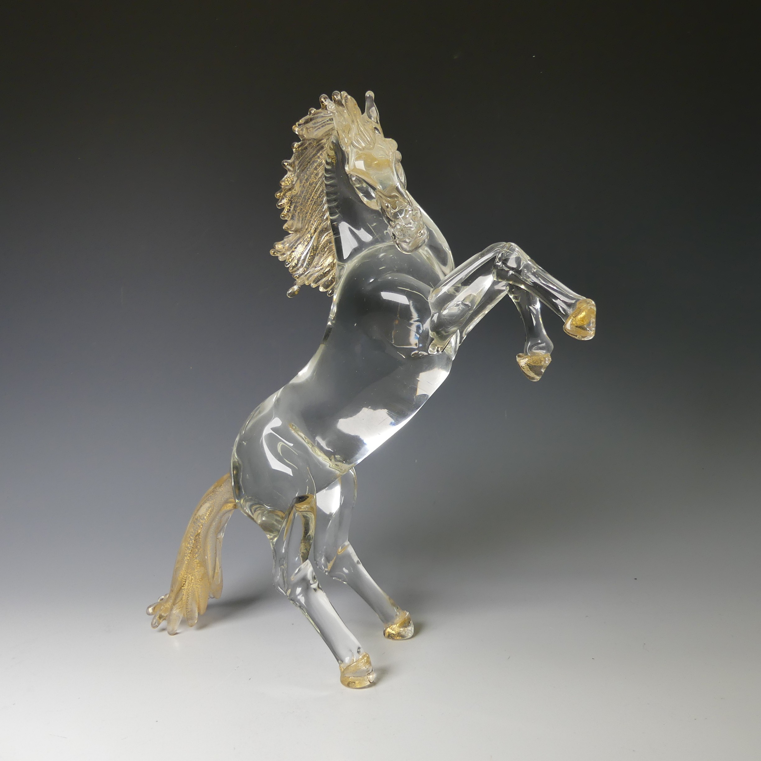 A Foscari Murano clear glass sculpture of a Rearing Horse, modelled in clear glass with gold