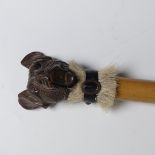 A late 19th century novelty automaton Walking Stick, the Black Forest pommel carved as the head of a