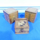 A pair of Novelty inlaid pecking bird cigarette Dispenser Boxes, together with another cigarette box