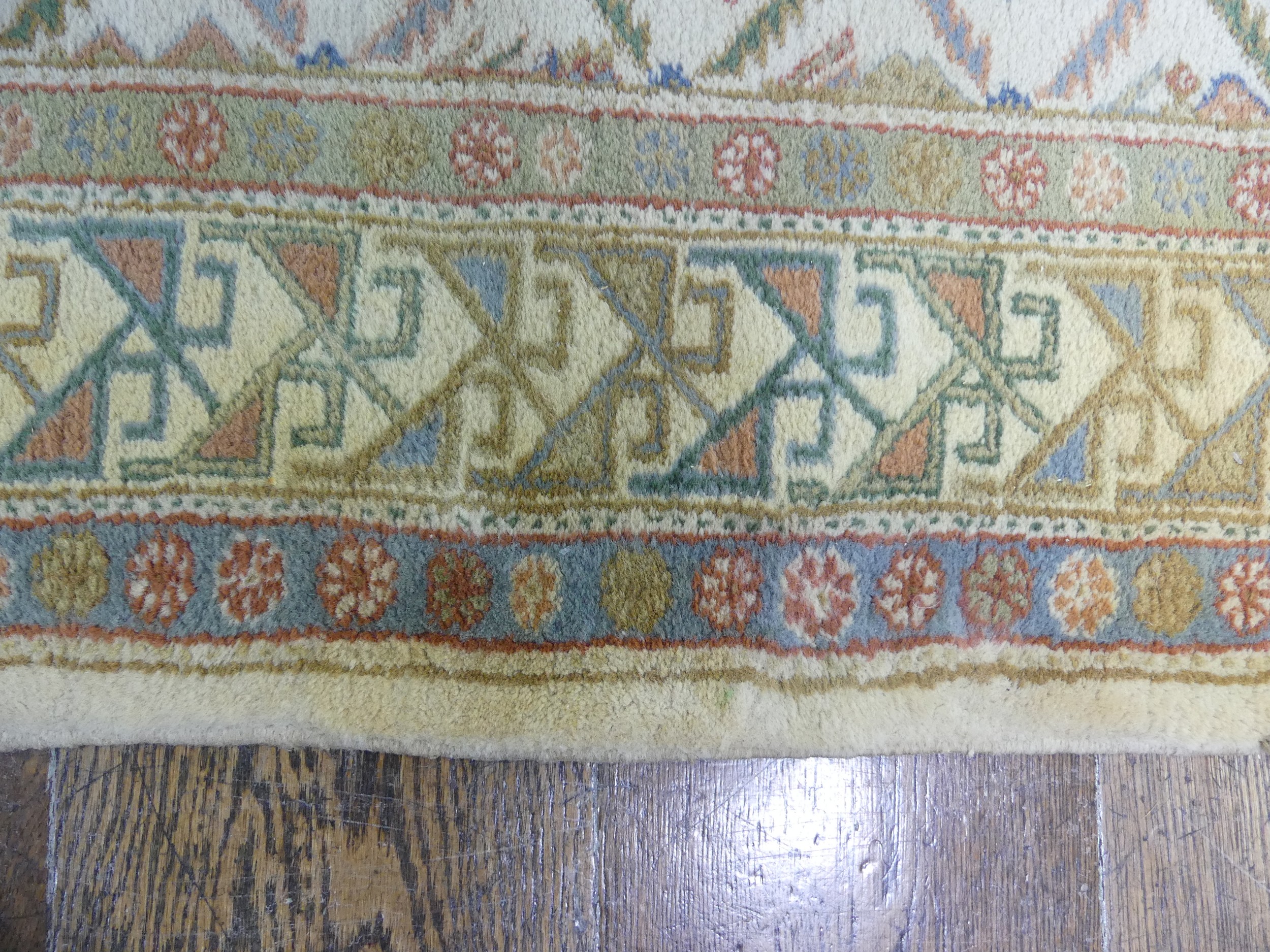 Tribal rugs; a hand-knotted runner, cream ground woven with geometric designs, thick wool pile on - Image 3 of 5