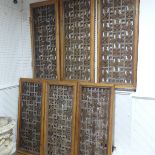 A set of six carved and pierced Chinese Window Shutters, with floral carvings on both sides, note