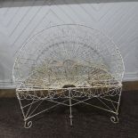 A 'Horizon' inspired semi-circular wrought iron Garden Seat with white paint finish, with metal wire