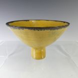 Emmanuel Cooper (British; 1938-2012) a studio pottery Footed Bowl, of yellow ground with manganese