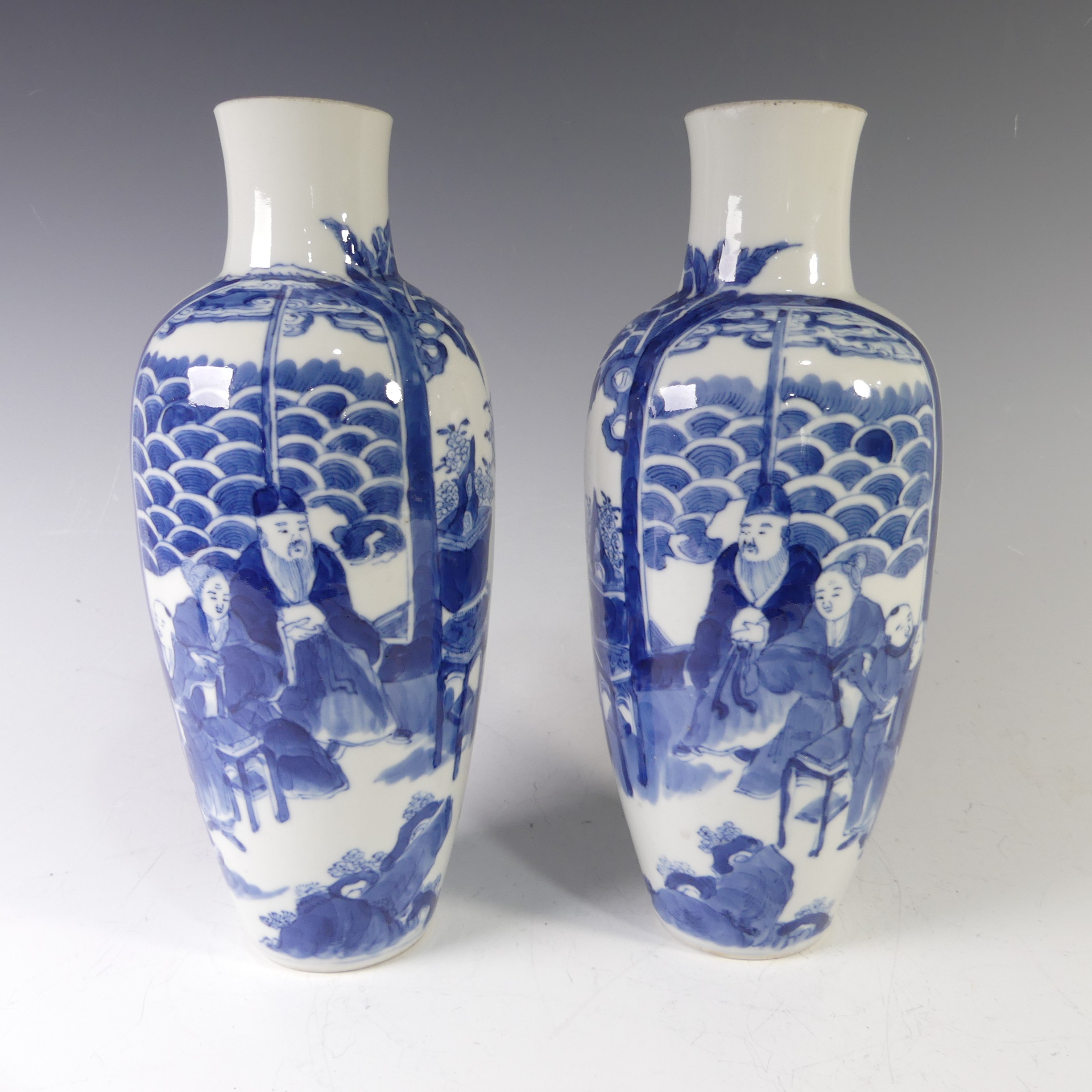 A pair of antique Chinese blue and white Vases, of slim baluster shapes, with underglaze blue