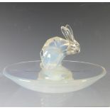 An R. Lalique opalescent glass 'Lapin Cendrier', with central rabbit depiction, small chip to ear,