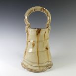 Takeshi Yasuda (Japanese b. 1943) a studio pottery stoneware Bucket, with light honey glaze and