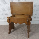 An Arts and Crafts oak stool by Waring and Gillow, with hinged seat, Waring and Gillow Lancashire