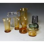 A quantity of Whitefriars controlled bubble design Glasswares, to comprise a large amber Jug,
