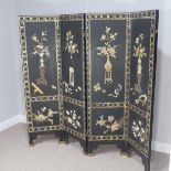 A 20thC Chinese inspired black lacquer Four-Fold Screen, with carved soapstone decoration and mother