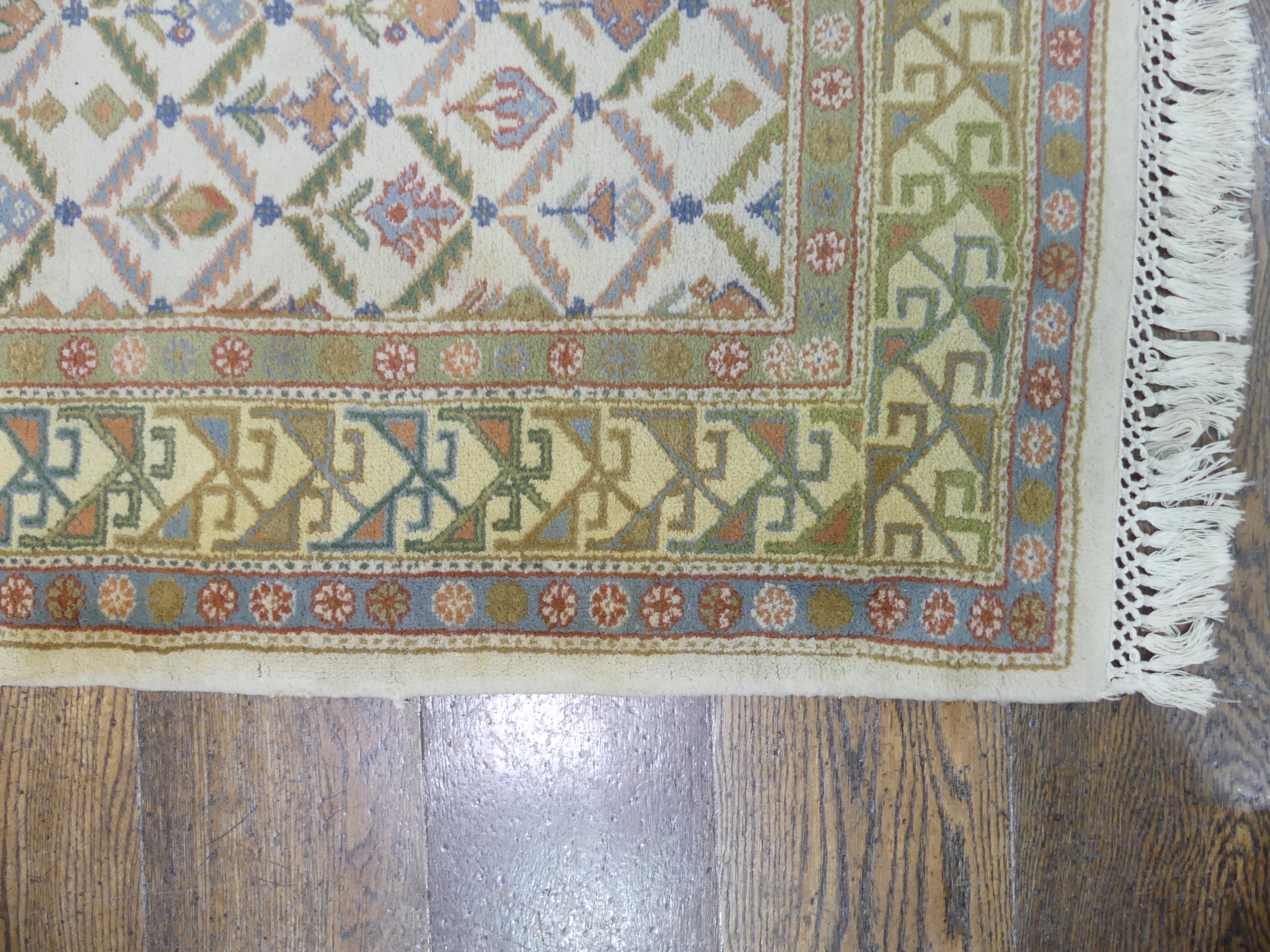 Tribal rugs; a hand-knotted runner, cream ground woven with geometric designs, thick wool pile on - Image 4 of 5
