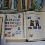 A large collection of Stamps in seven albums and various loose stamps on envelopes, together with
