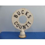 A Vintage cast iron 'Bucks County' circular Road Sign, W 45 cm x H 59 cm x D 16 cm.