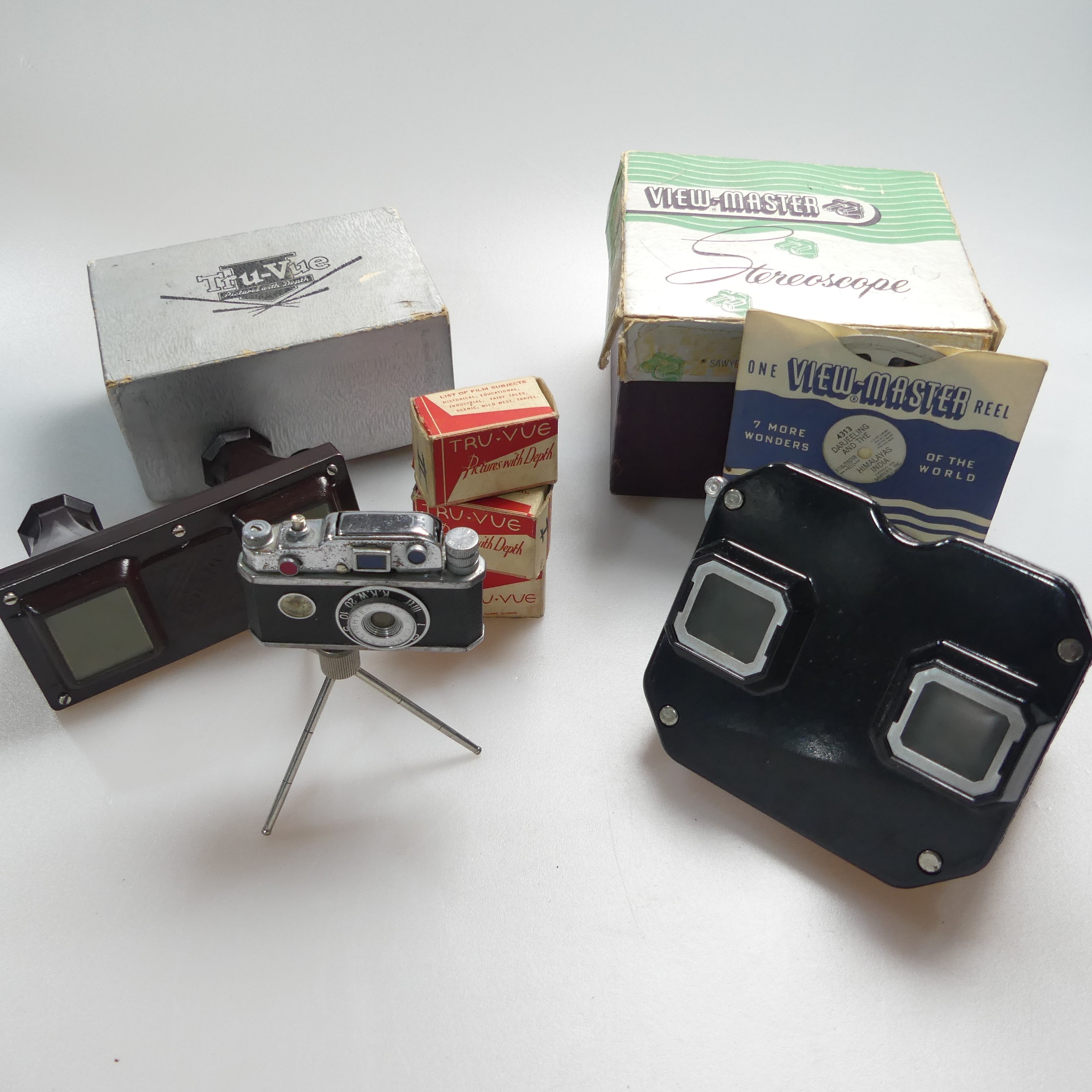 K.K.W. novelty miniature Camera Lighter on tripod, H: 9cm, including tripod, together with a vintage