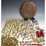 A large quantity of ROAC cap Badges, Pins, Medals and a carved Plaque, together with other