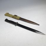 A WWII German Mauser bayonet with Bakelite grips, dated 41 CUL, marked 5310, together with steel