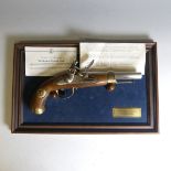 A good replica Napoleon Flintlock pistol 'Le Pistolet A Silex Napoleonien' by 'Franklin mint