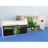 An ERTL John Deere 45 Combine, Prestige Series in original box together with an ERTL John Deere