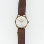 A vintage Audax 9ct gold gentleman's Wristwatch, with Swiss movement, the circular dial with gilt
