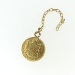 A Danish 20 Kroner gold Coin, dated 1916, soldered to mount/chain, chain tests as 18ct, total weight