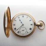 A 9ct gold Half Hunter Pocket Watch, the white enamel dial with Arabic Numerals and subsidiary
