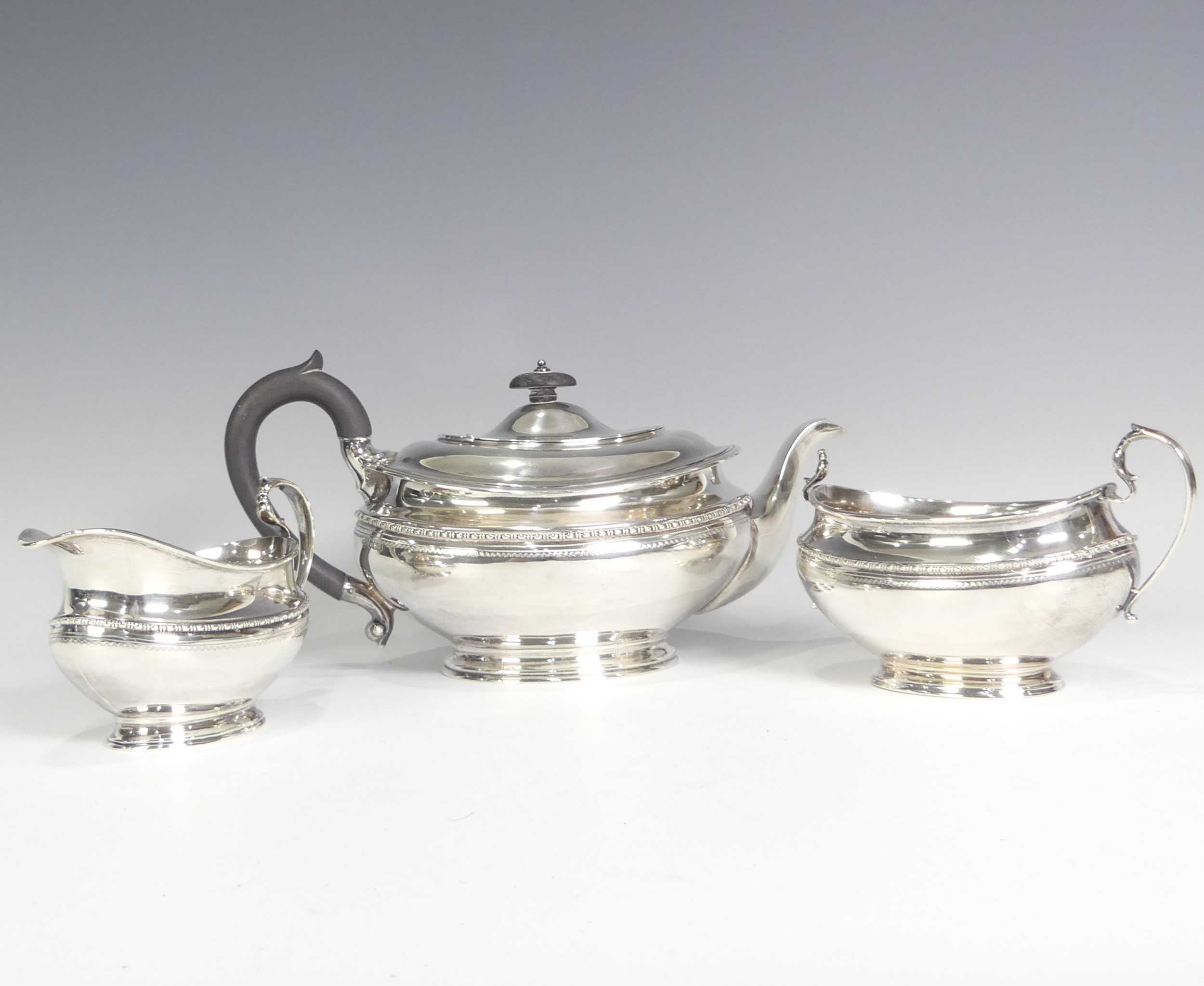 A George V silver three piece Tea Set, by Goldsmiths & Silversmiths Co Ltd., hallmarked Sheffield