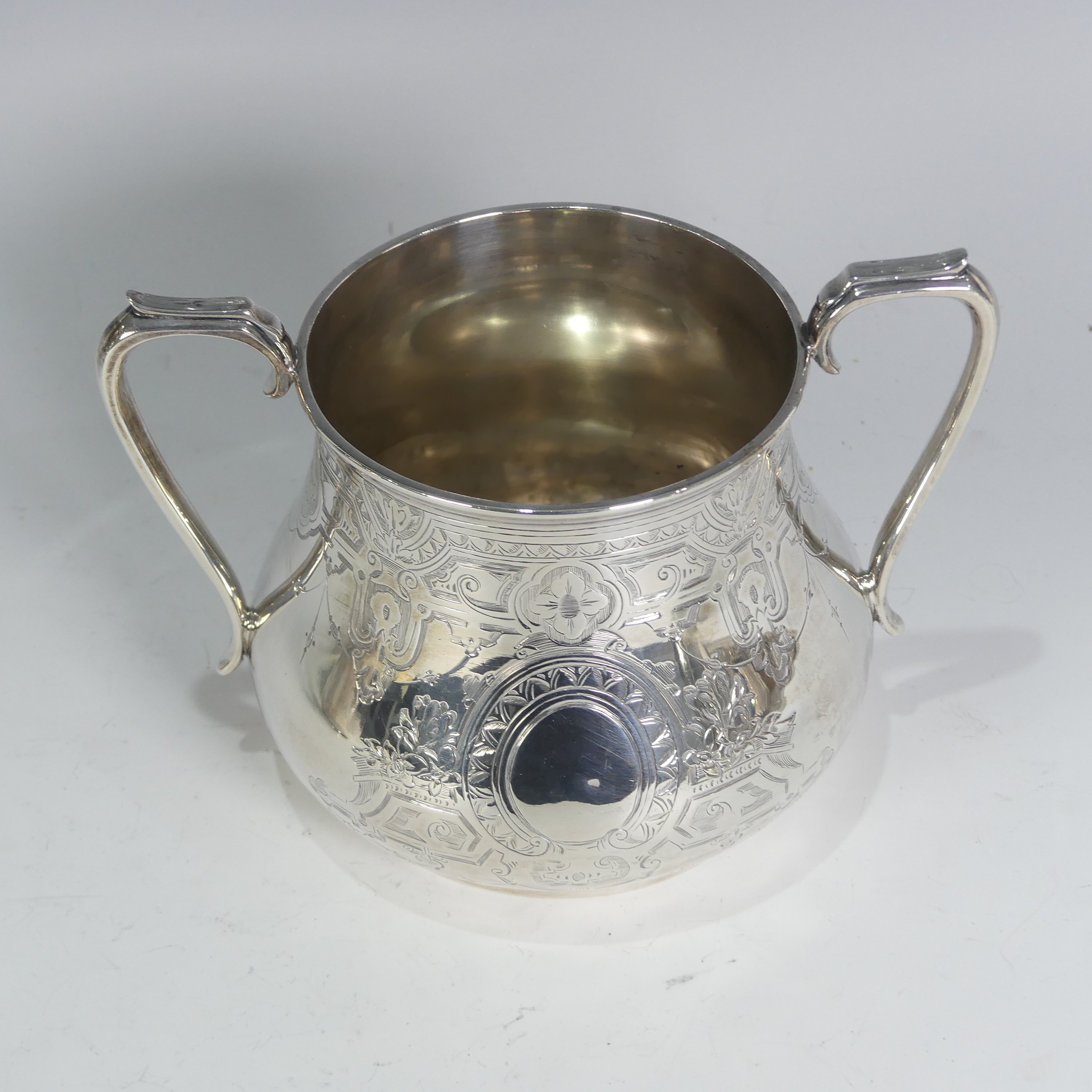 A Victorian silver four piece Tea Set, by William Hunter & Son, hallmarked London, 1866, of baluster - Image 5 of 11