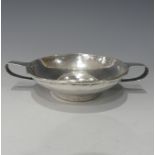 A.E.Jones; A George V silver two handled Bowl, hallmarked Birmingham, 1912, of shallow form with