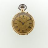 A Continental 14k yellow gold Fob Watch, with scrolling foliate decoration, gilt dial with Roman