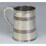 A George V silver Mug, by Mappin & Webb Ltd., hallmarked Sheffield, 1917, tapering with bands of