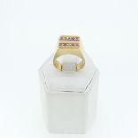 An unmarked yellow gold Ring, the square front set two rows of pink stones, two missing, tests as