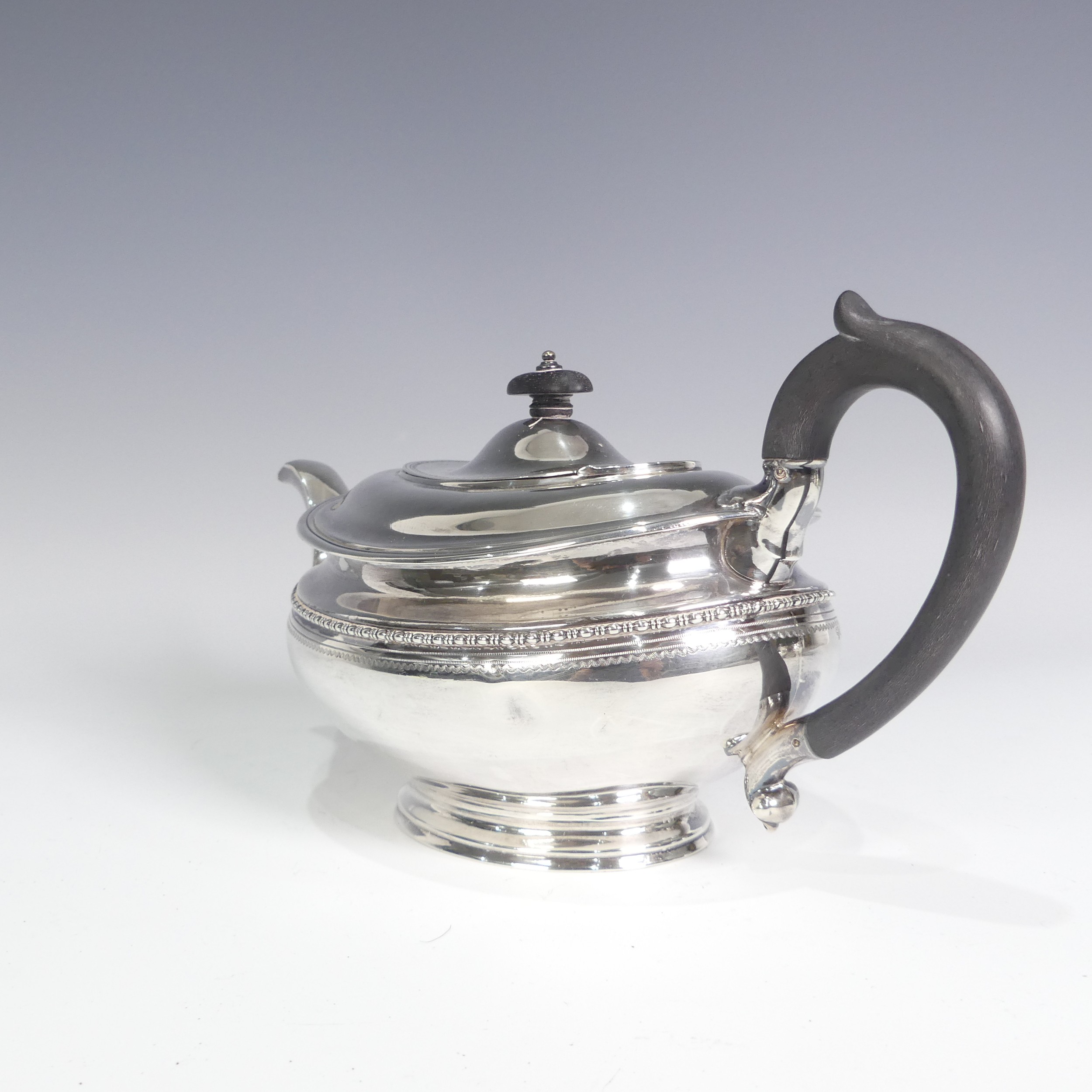 A George V silver three piece Tea Set, by Goldsmiths & Silversmiths Co Ltd., hallmarked Sheffield - Image 12 of 14