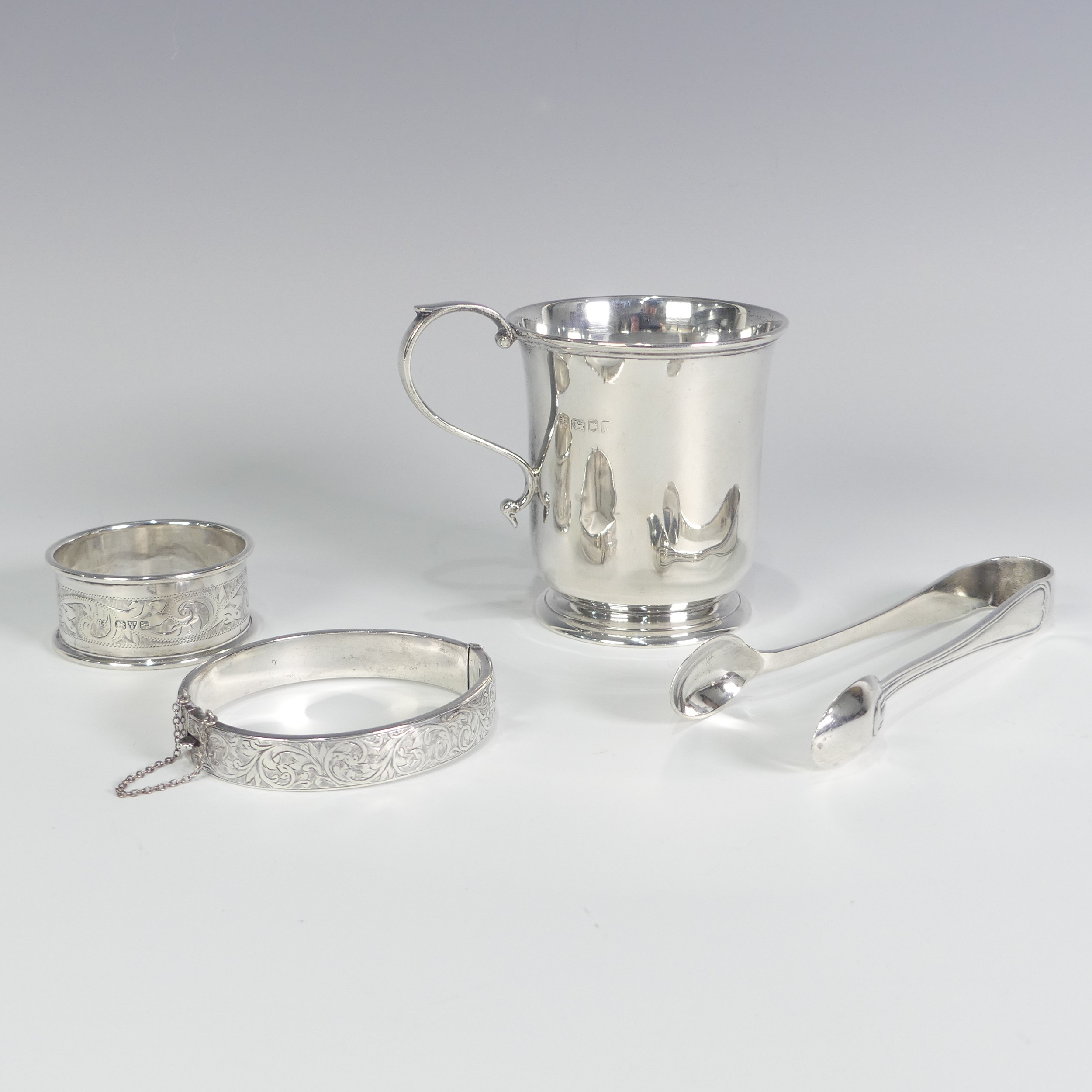 A George VI silver Christening Mug, by Edward Barnard & Sons Ltd., hallmarked London, 1950, plain