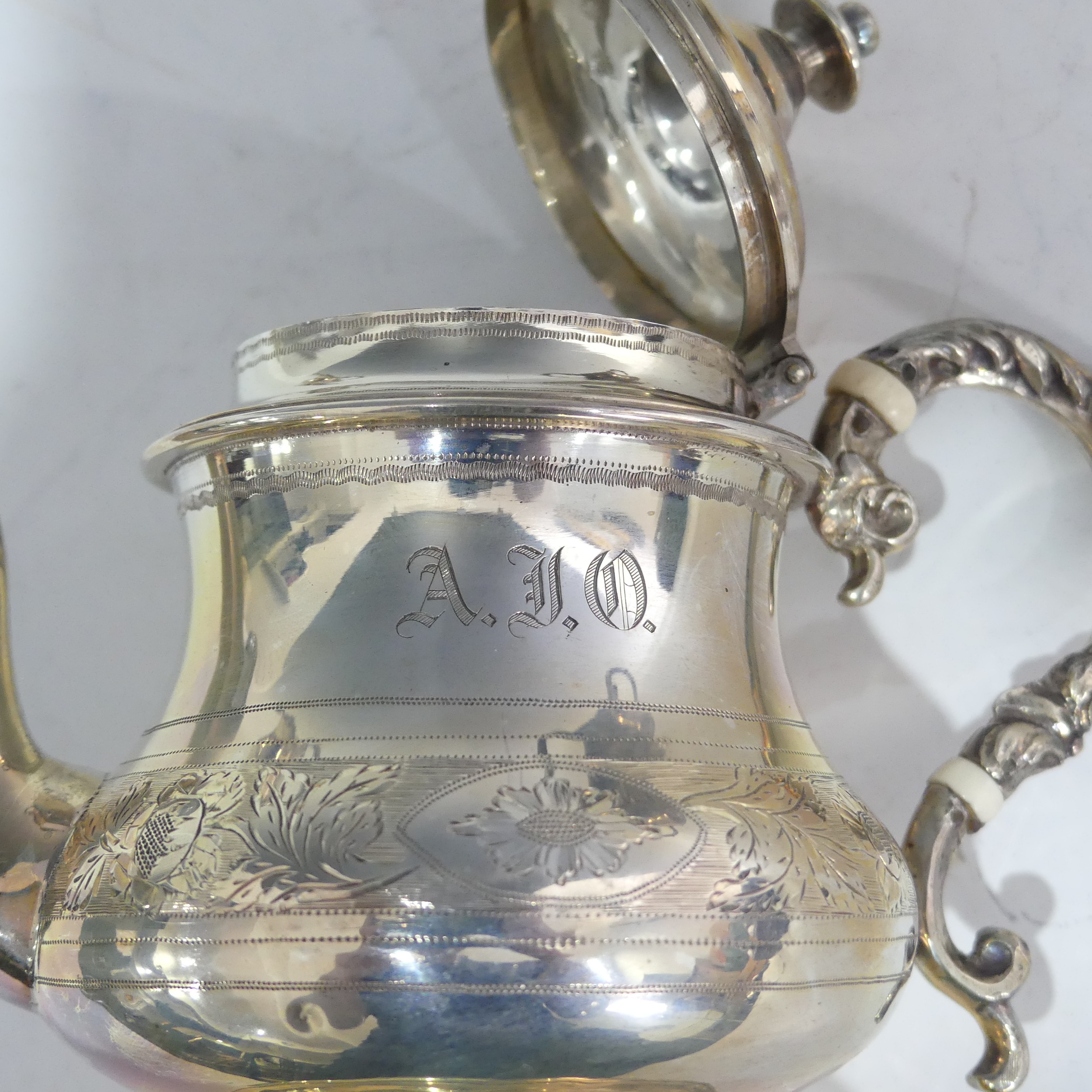 A cased Victorian silver three piece bachelor Tea Set, by Daniel & Charles Houle, hallmarked London, - Image 6 of 17