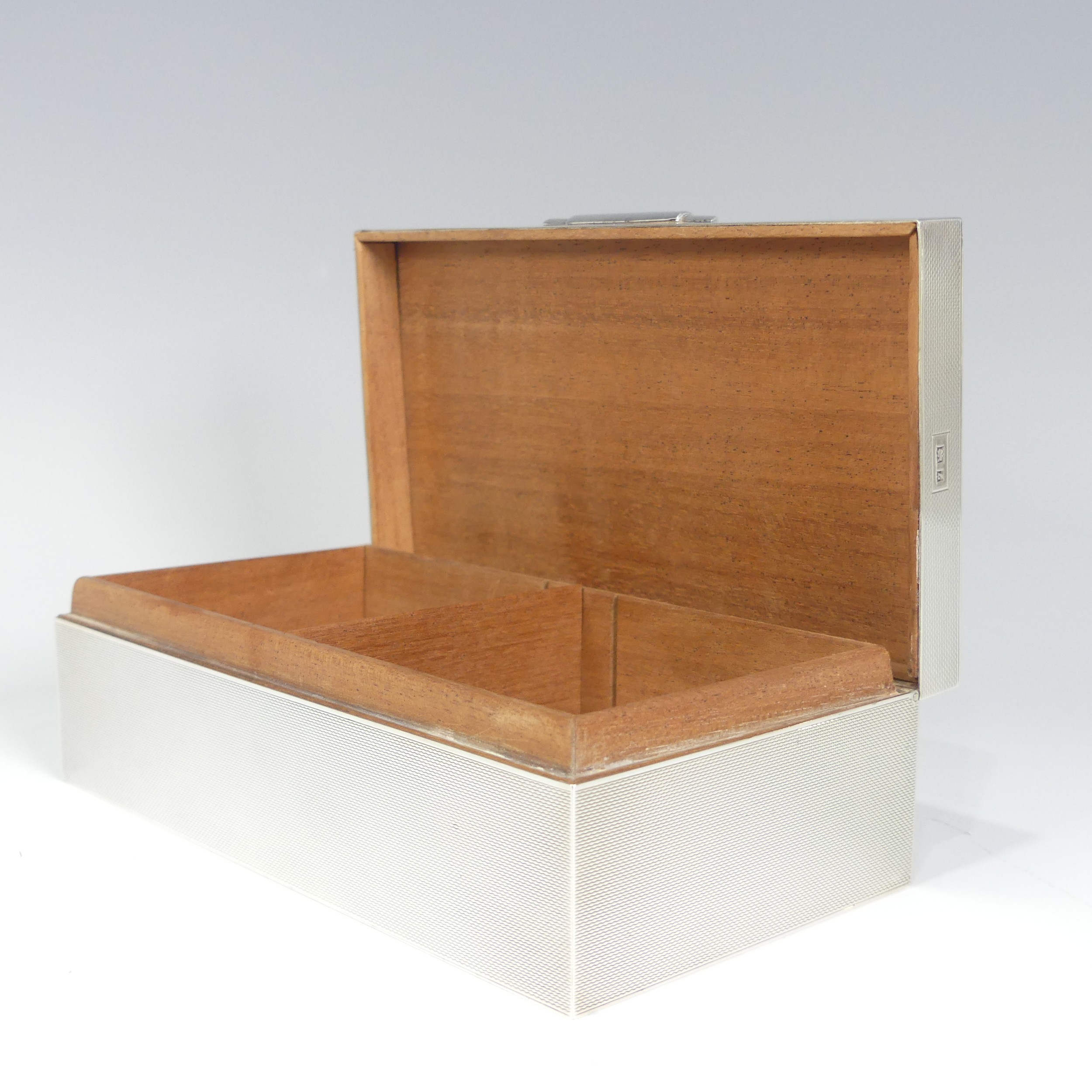 An Elizabeth II silver Cigarette Box, by W H Manton Ltd., hallmarked Birmingham 1960, of rectangular - Image 3 of 3