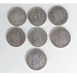 Four Victorian silver Double Florins; dated 1887, 1889, 2x 1890, together with a George III crown