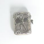 Golf Interest; A Novelty silver Vesta Case, both sides with depiction of a golfer taking a swing,