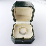 An 18ct yellow gold seven stone diamond Ring, estimated total diamond weight 0.5ct, claw set in