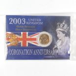 An Elizabeth II 'Bullion' gold Half Sovereign, dated 2003, in carded blister pack.