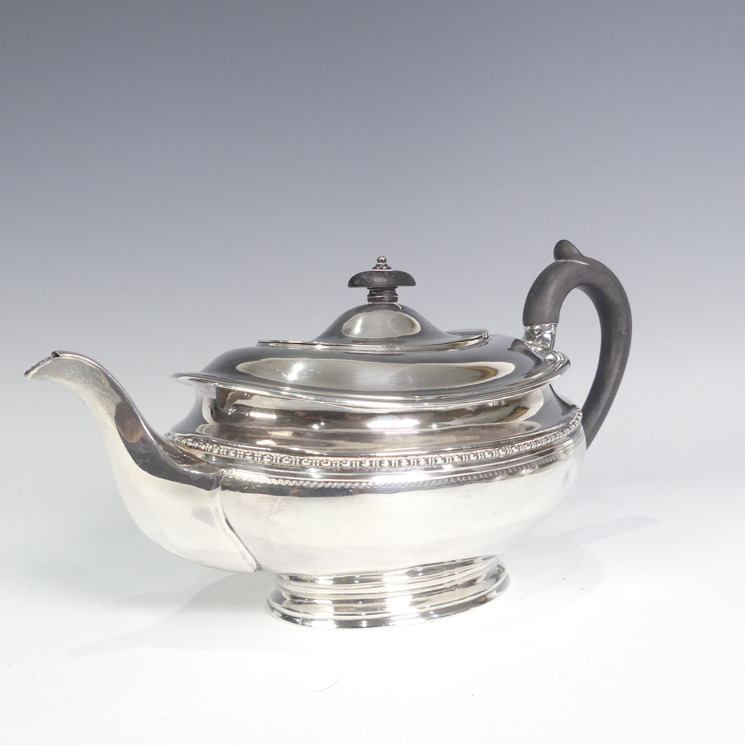 A George V silver three piece Tea Set, by Goldsmiths & Silversmiths Co Ltd., hallmarked Sheffield - Image 11 of 14