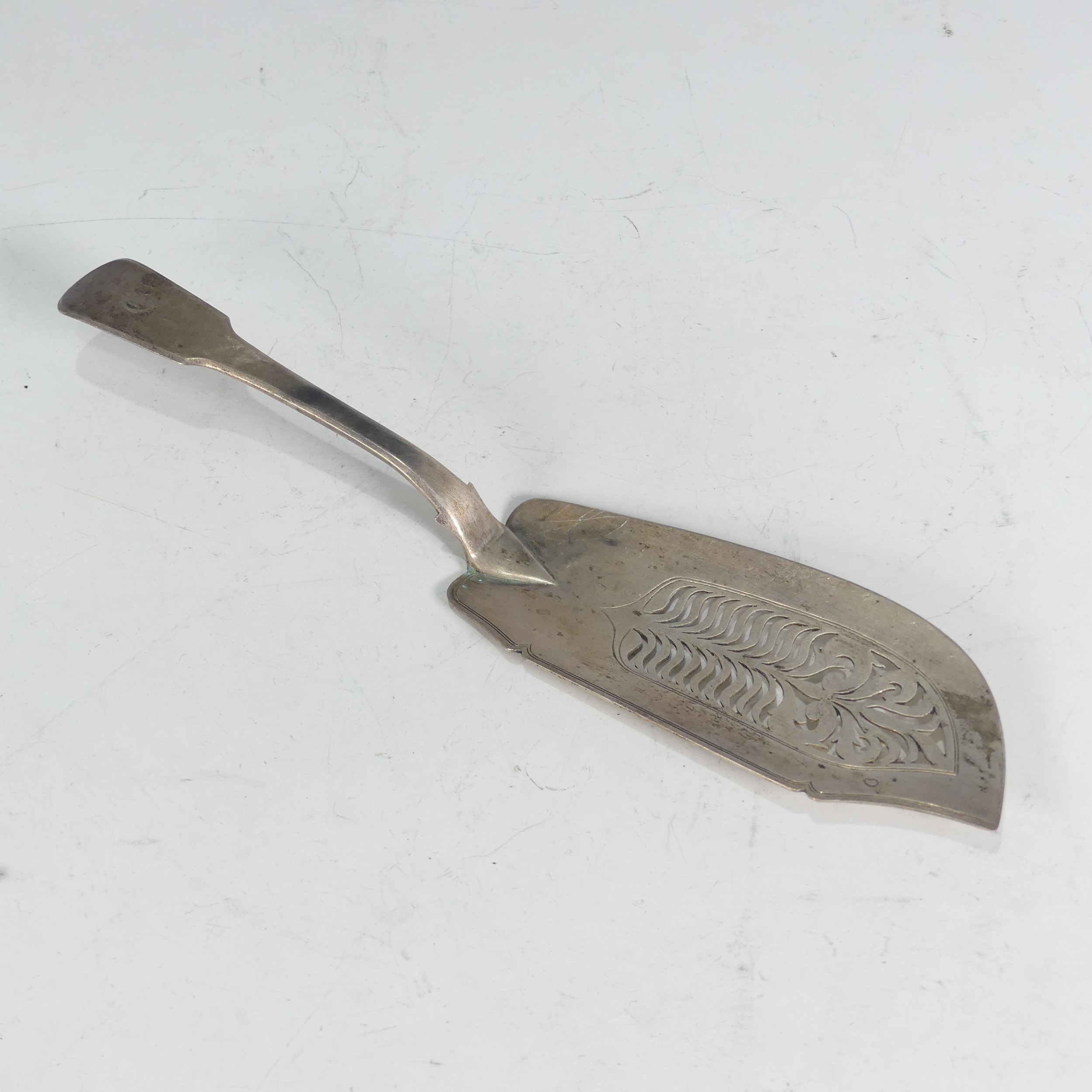 A George IV silver Fish Slice, by William Knight II, hallmarked London, 1825, fiddle pattern,