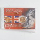An Elizabeth II 'Bullion' gold Sovereign, dated 2003, in carded blister pack.